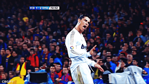 Soccer Player Celebrates Goal Between FCB and RMA