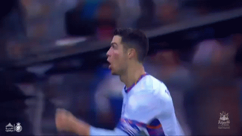 Soccer Player Celebrating Goal With Fist In Air GIF