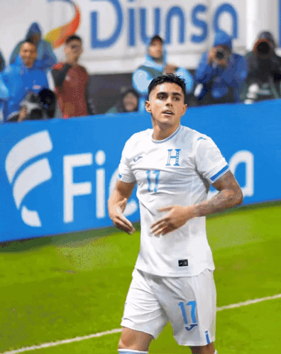 Soccer Player Celebrating Goal With Letter H