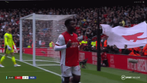 Soccer Player Celebrating in Fly Emirates Jersey
