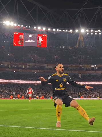 Soccer Player Celebrating in Snapdragon Jersey