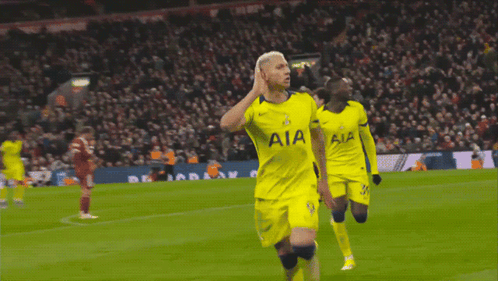 Soccer Player Celebrating in Yellow Jersey