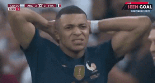 Soccer Player Covering Ears