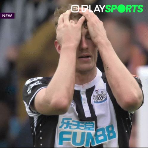 Soccer Player Covering Eyes