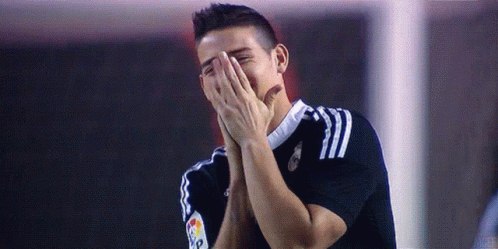 Soccer Player Covering Face And Laughing GIF