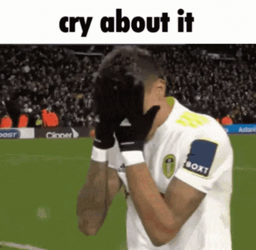 Soccer Player Covering Face Crying