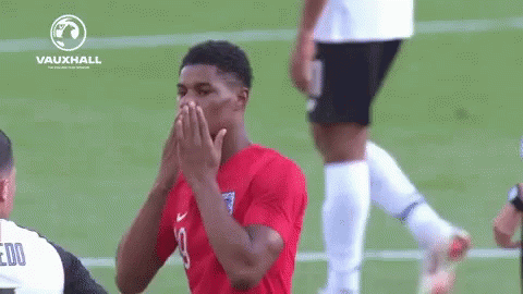 Soccer Player Covering Face