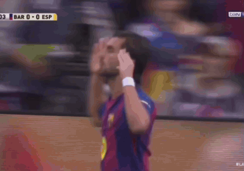 Soccer Player Covering Face With Hands