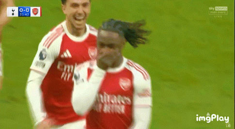 Soccer Player Covering Mouth, Another Laughing