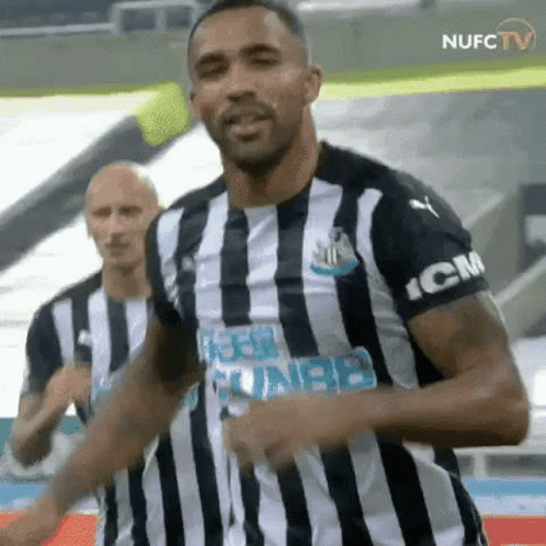Soccer Player Dancing in Black and White Stripes