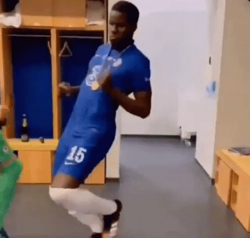 Soccer Player Dancing in Locker Room