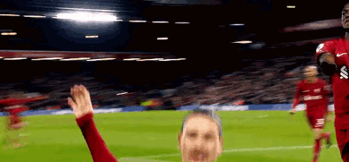 Soccer Player Giving High Five