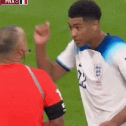 Soccer Player Giving Middle Finger in White Emirates Jersey