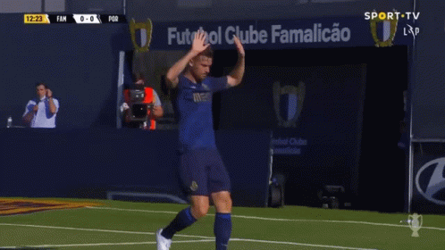 Soccer Player High Fiving by Ventilation Sign