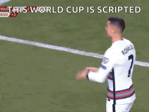 Soccer Player Holding Blue Card Saying This World Cup Is Scripted