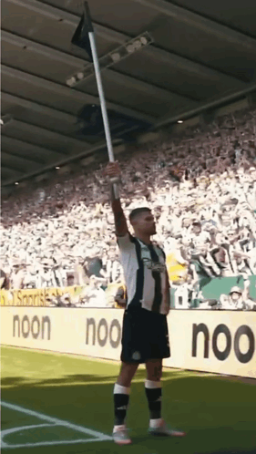 Soccer Player Holding Flag