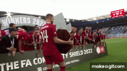 Soccer Player Holding Trophy Number 14 GIF
