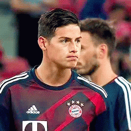 Soccer Player In Adidas Jersey Next To Another Soccer Player GIF