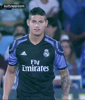 Soccer Player In Black And Purple Fly Emirates Jersey GIF
