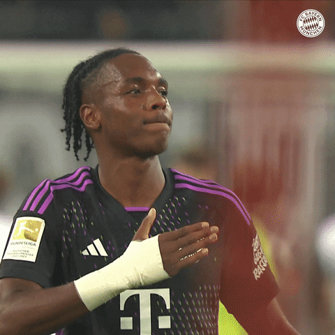 Soccer Player in Black and Purple Shirt