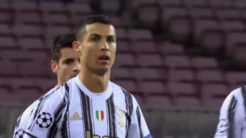 Soccer Player in Black and White Jersey at Stadium