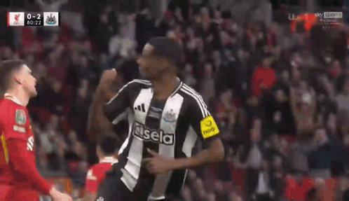 Soccer Player in Black and White Jersey Saying Usela