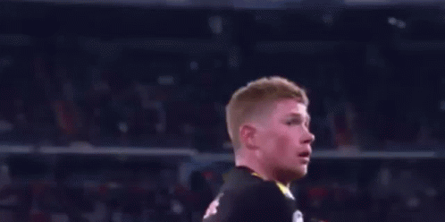 Soccer Player in Black Jersey Number 12