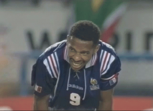Soccer Player in Blue Adidas Jersey Number 9