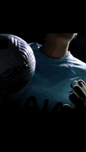 Soccer Player in Blue AIA Shirt