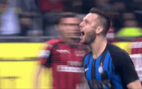 Soccer Player in Blue and Black Inter Jersey