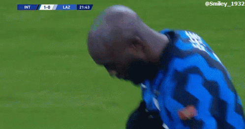 Soccer Player in Blue and Black Irelli Uniform