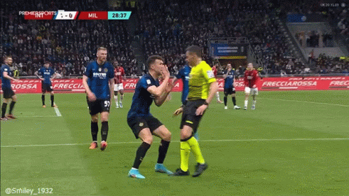 Soccer Player in Blue and Black Jersey Number 4
