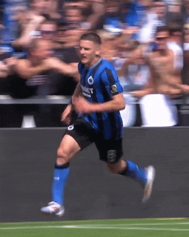 Soccer Player in Blue and Black Jersey Saying Connect