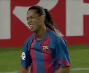 Soccer Player in Blue and Pink Jersey Number 8