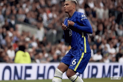 Soccer Player In Blue And Yellow Jersey Number 6 GIF