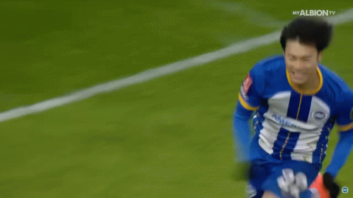 Soccer Player in Blue and Yellow Jersey Number 7
