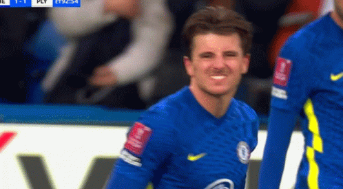 Soccer Player In Blue And Yellow Jersey Smiling GIF