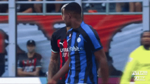 Soccer Player in Blue Black Jersey Saying Uni Vitalbit