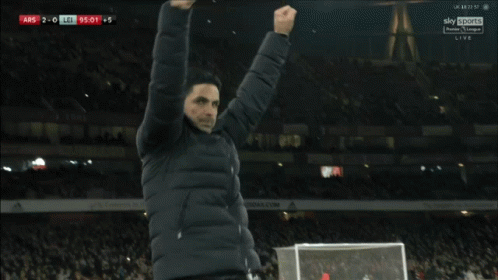 Soccer Player In Blue Emirates Shirt In Front Of Sign GIF
