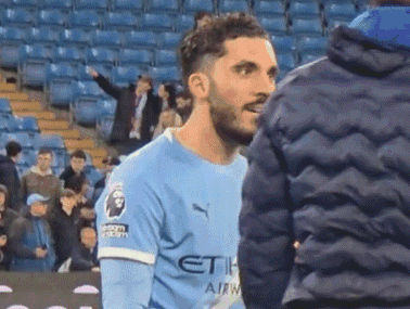Soccer Player in Blue Etihad Jersey Talking to Fan