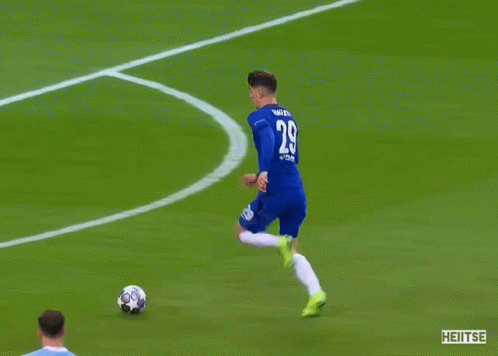 Soccer Player in Blue Jersey Heitse