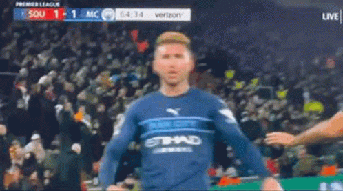 Soccer Player in Blue Jersey in Front of Crowd