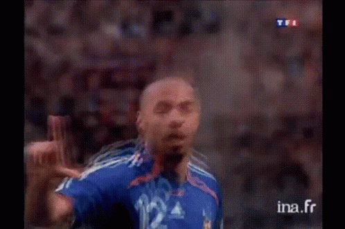 Soccer Player in Blue Jersey Number 12