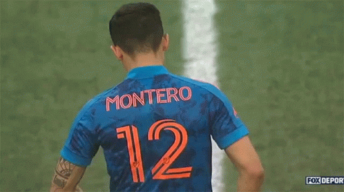 Soccer Player In Blue Jersey Number 12 GIF