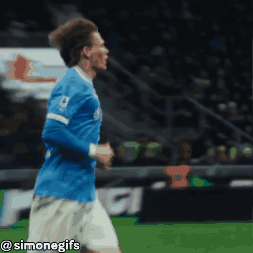Soccer Player in Blue Jersey Number 12