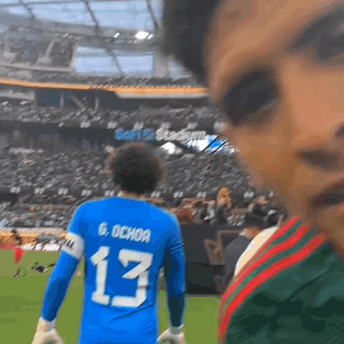 Soccer Player In Blue Jersey Number 13 GIF