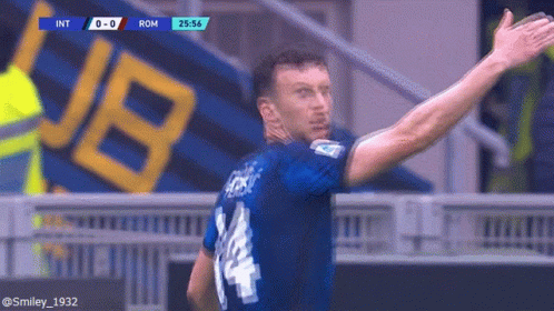 Soccer Player in Blue Jersey Number 14