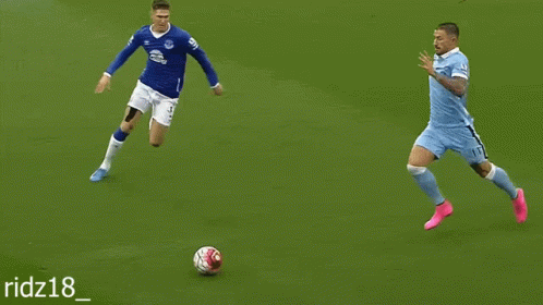 Soccer Player In Blue Jersey Number 18 GIF