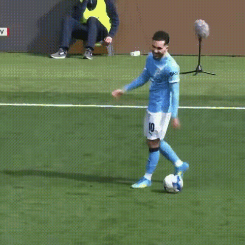 Soccer Player in Blue Jersey Number 22