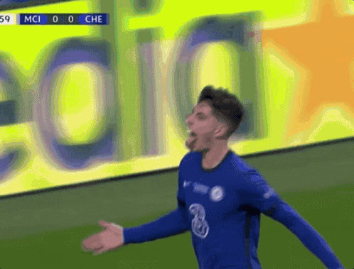 Soccer Player in Blue Jersey Number 3 Celebrating